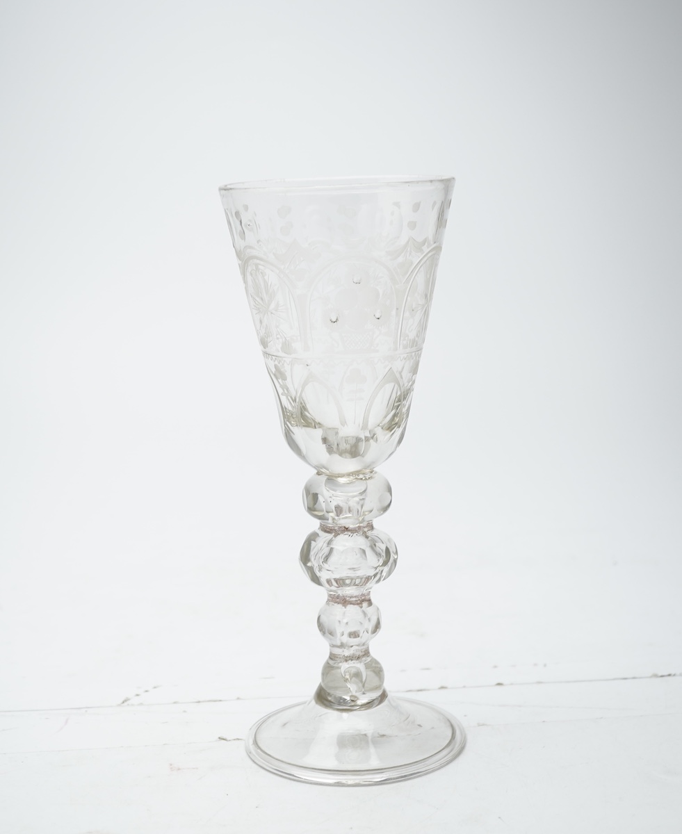 A tall Bohemian faceted glass goblet, c.1750